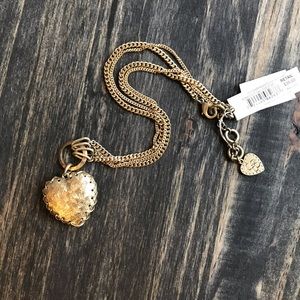Jessica Simpson heart necklace